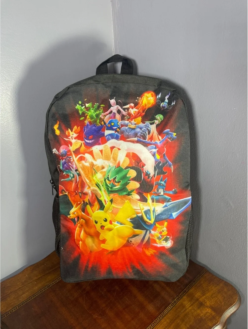 Black Backpack with Colorful Pokémon Print